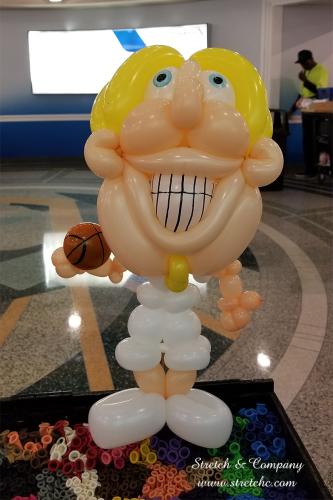 Balloon twisting parody of Dallas Mavericks star Dirk Nowitzki at a Mavs game