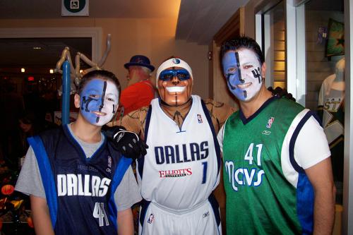 Mavs Man with two Dallas Mavericks fans sporting painted faces
